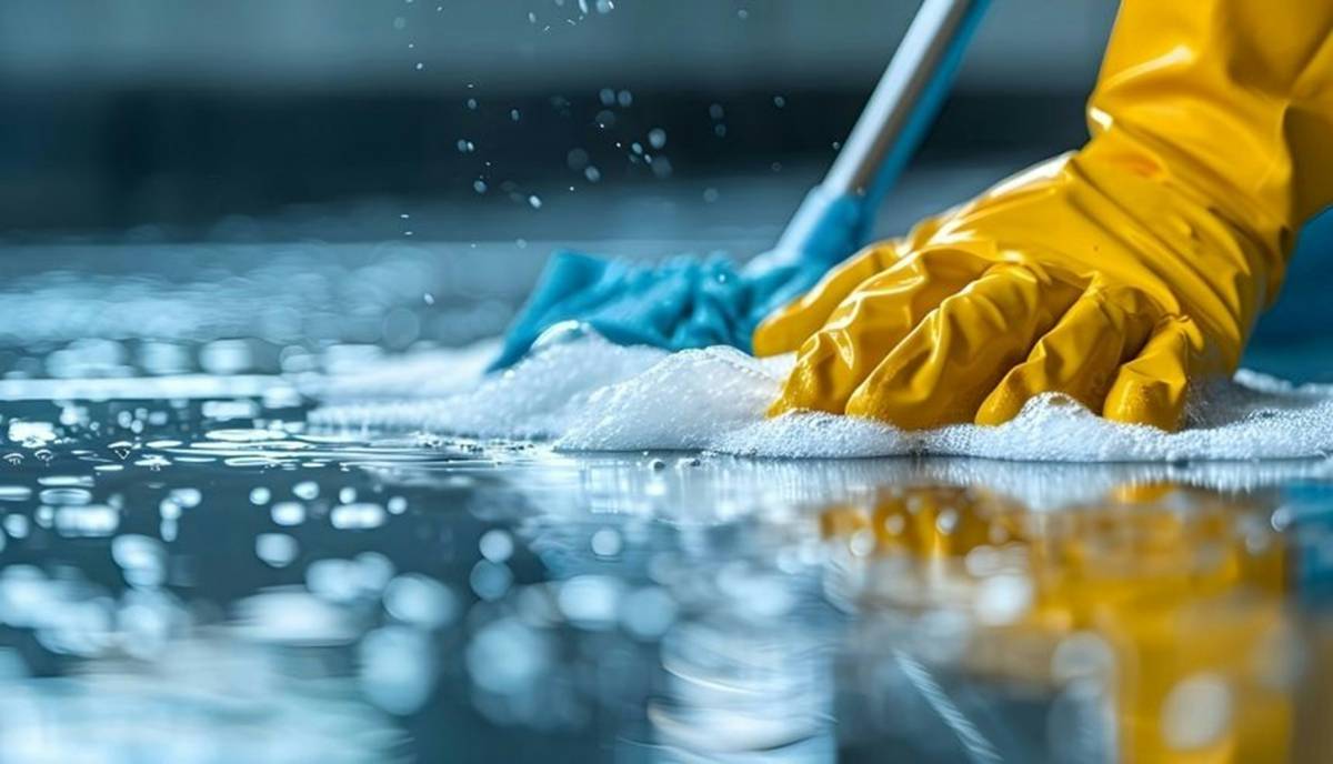 DIY green home natural tip eco friendly cleaning kit with vinegar, baking soda, and castile soap on wooden counter