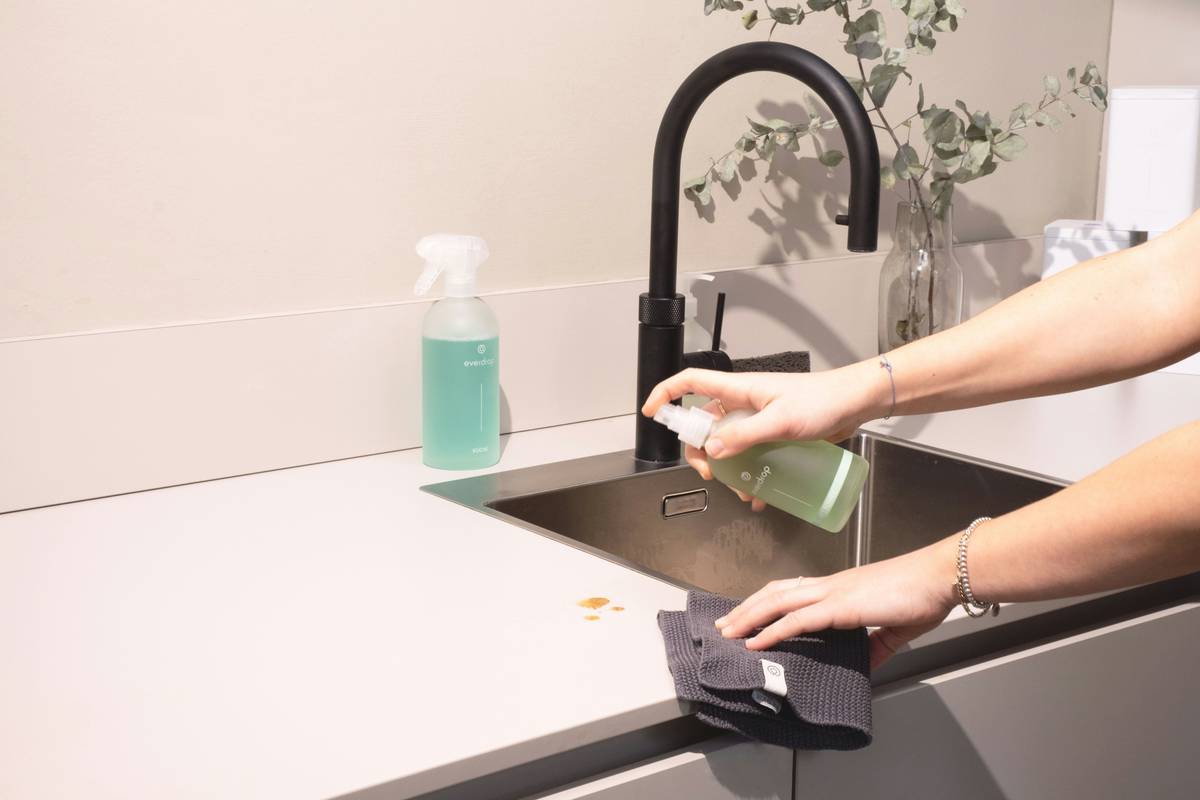 Eco home cleaning services using reusable glass bottles and plant-based concentrates